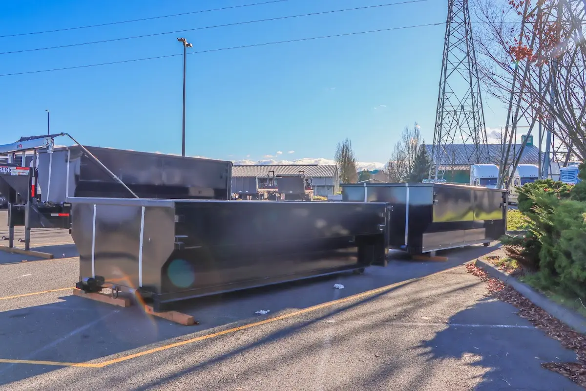 Roll-off dumpster ready for waste disposal at job site for 3 Yard Dumpster Rental in Lexington